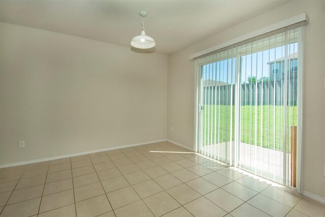 1407 Swan Ridge Dr, Sherman, TX 75092 - spare room featuring baseboards and light tile patterned flooring