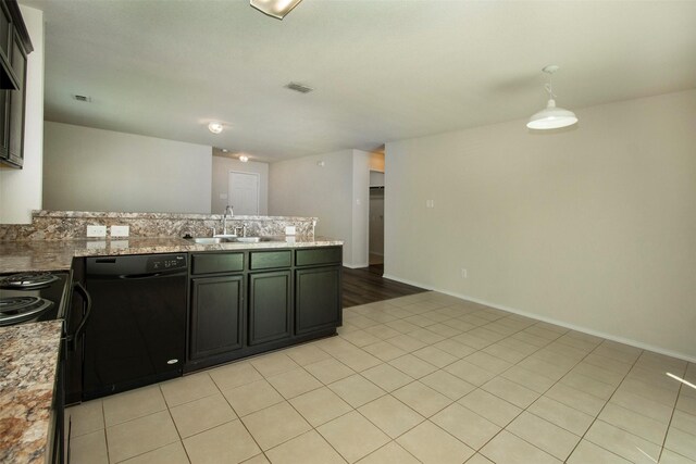 1407 Swan Ridge Dr, Sherman, TX 75092 - kitchen with a sink, dishwasher, a peninsula, light stone counters, and pendant lighting