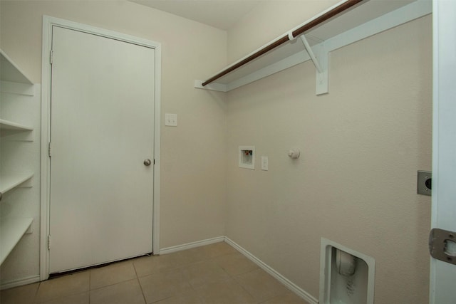 1407 Swan Ridge Dr, Sherman, TX 75092 - laundry room with electric dryer hookup, hookup for a gas dryer, hookup for a washing machine, baseboards, and light tile patterned floors
