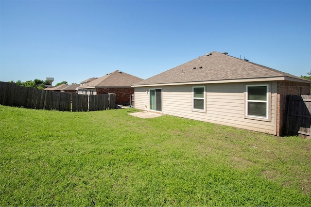 1407 Swan Ridge Dr, Sherman, TX 75092 - rear view of property featuring a shingled roof