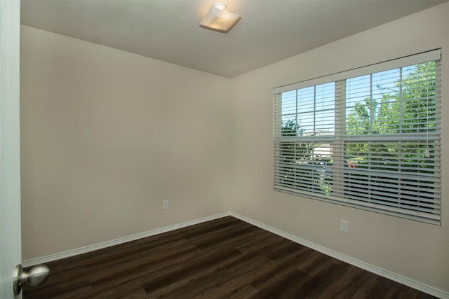 1407 Swan Ridge Dr, Sherman, TX 75092 - unfurnished room with dark wood finished floors and baseboards