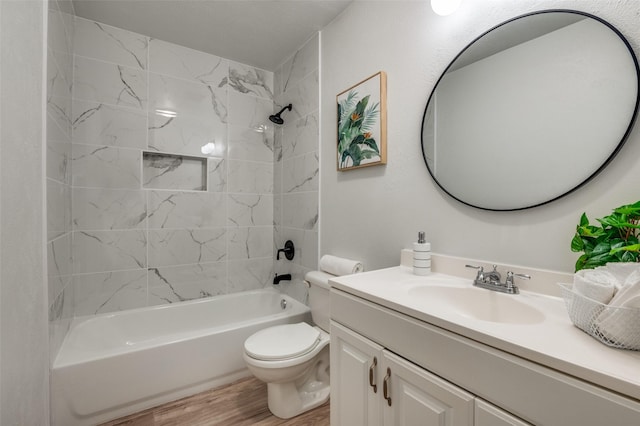 2209 Sheriff Dr, Grand Prairie, TX 75051 - full bathroom featuring toilet, wood finished floors, shower / washtub combination, and vanity