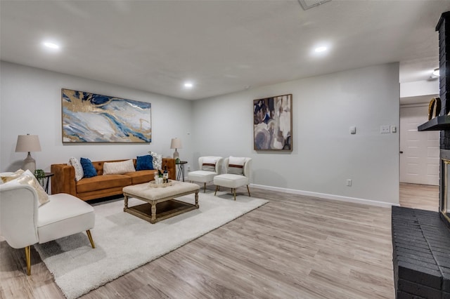 2209 Sheriff Dr, Grand Prairie, TX 75051 - living area with recessed lighting, light wood-style floors, and baseboards