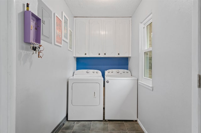 115 Mill Pond Rd, Denton, TX 76209 - laundry room with cabinet space, washing machine and dryer, a textured ceiling, and baseboards