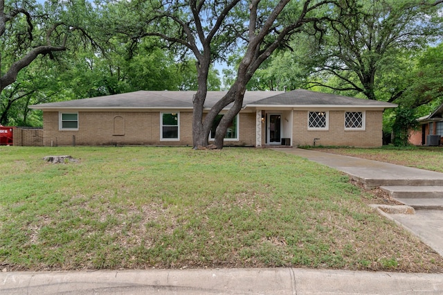 115 Mill Pond Rd, Denton, TX 76209 - ranch-style house with concrete driveway, a front yard, and brick siding