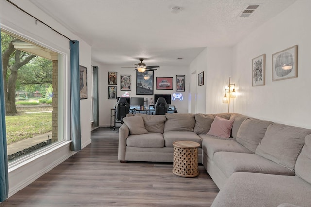 115 Mill Pond Rd, Denton, TX 76209 - living area featuring a desk, a ceiling fan, wood finished floors, and baseboards