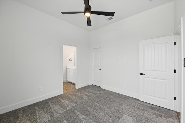 500 Longhorn Dr, Springtown, TX 76082 - unfurnished bedroom with carpet floors, baseboards, and ensuite bath