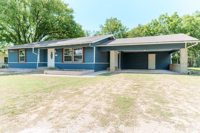 103 N 6th St E, Dawson, TX 76639 - ranch-style house featuring a front yard, a carport, and covered porch