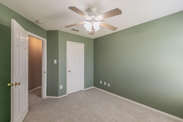 8301 Clearbrook Dr, Fort Worth, TX 76123 - unfurnished bedroom with carpet flooring, baseboards, and ceiling fan