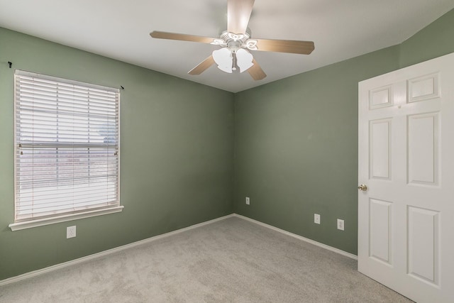 8301 Clearbrook Dr, Fort Worth, TX 76123 - empty room featuring carpet floors, a ceiling fan, and baseboards