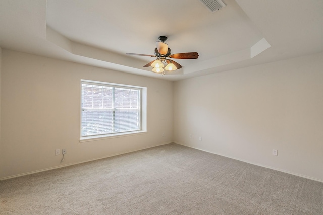 8301 Clearbrook Dr, Fort Worth, TX 76123 - empty room featuring ceiling fan, carpet, baseboards, and a raised ceiling