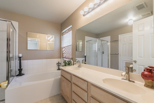 8301 Clearbrook Dr, Fort Worth, TX 76123 - bathroom featuring a shower stall, a bath, tile patterned flooring, double vanity, and a baseboard heating unit