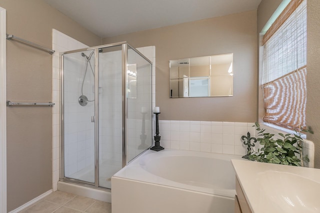 8301 Clearbrook Dr, Fort Worth, TX 76123 - bathroom with a shower stall, a garden tub, vanity, and tile patterned flooring