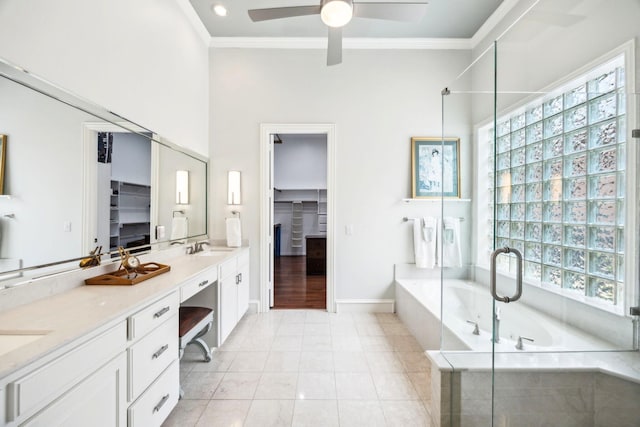 3024 Greenhill Dr, Plano, TX 75093 - full bathroom with ornamental molding, healthy amount of natural light, a ceiling fan, a garden tub, and double vanity