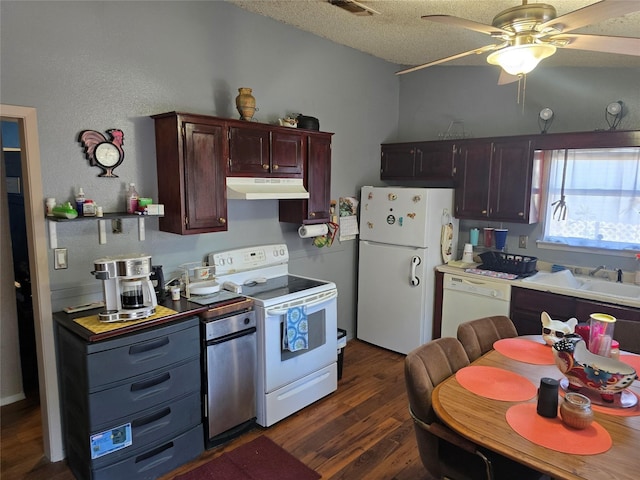 231 County Road 34715, Paris, TX 75460 - kitchen with white appliances, under cabinet range hood, ceiling fan, dark wood finished floors, and a textured ceiling