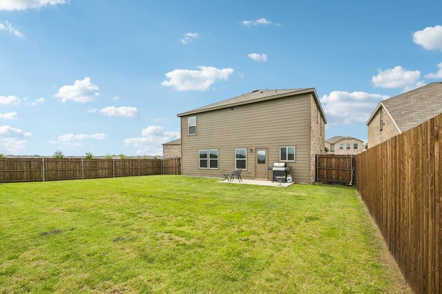 1229 Autumn Mist Ln, Forney, TX 75126 - rear view of house with a patio area