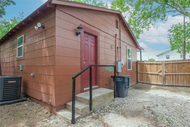 409 Forby Ave, Fort Worth, TX 76103 - view of side of home with fence and central AC unit