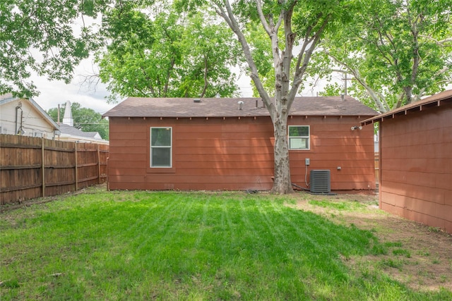 409 Forby Ave, Fort Worth, TX 76103 - rear view of house with roof with shingles and central AC