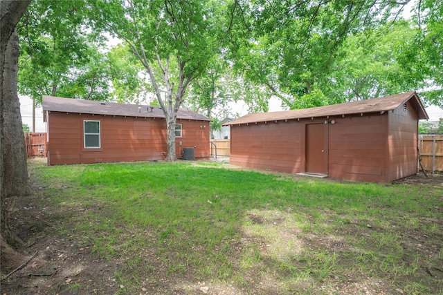 409 Forby Ave, Fort Worth, TX 76103 - view of yard featuring cooling unit and an outdoor structure