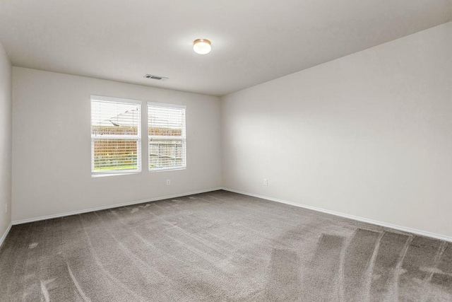 133 Feverbush Dr, Fate, TX 75189 - carpeted empty room featuring baseboards
