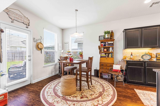 10805 Aurora Dr, Waco, TX 76708 - dining area with dark wood finished floors and baseboards