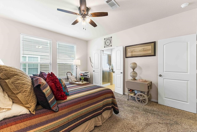 10805 Aurora Dr, Waco, TX 76708 - carpeted bedroom featuring ensuite bathroom, baseboards, and a ceiling fan