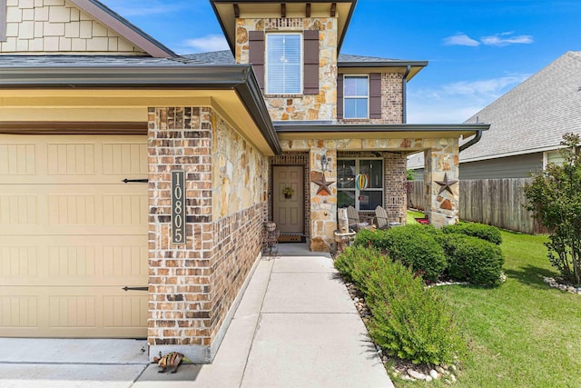 10805 Aurora Dr, Waco, TX 76708 - entrance to property with a garage, brick siding, a porch, and stone siding