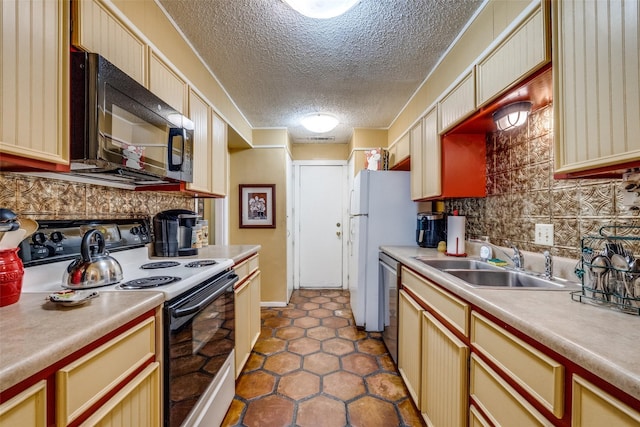 2043 Fleur De Lis Ct, Arlington, TX 76012 - kitchen featuring electric stove, black microwave, a sink, dishwasher, and backsplash