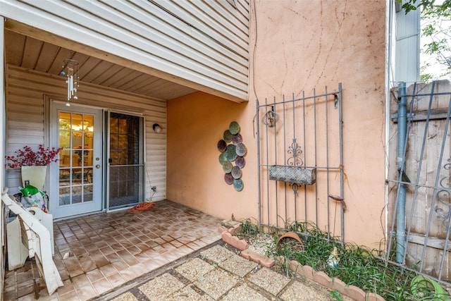 2043 Fleur De Lis Ct, Arlington, TX 76012 - property entrance featuring stucco siding