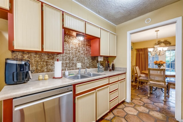 2043 Fleur De Lis Ct, Arlington, TX 76012 - kitchen with dishwasher, a sink, a chandelier, tasteful backsplash, and light countertops