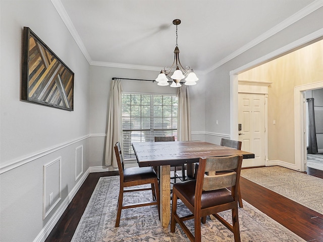 832 Adams Dr, Burleson, TX 76028 - dining space featuring a chandelier, dark wood-style flooring, and ornamental molding