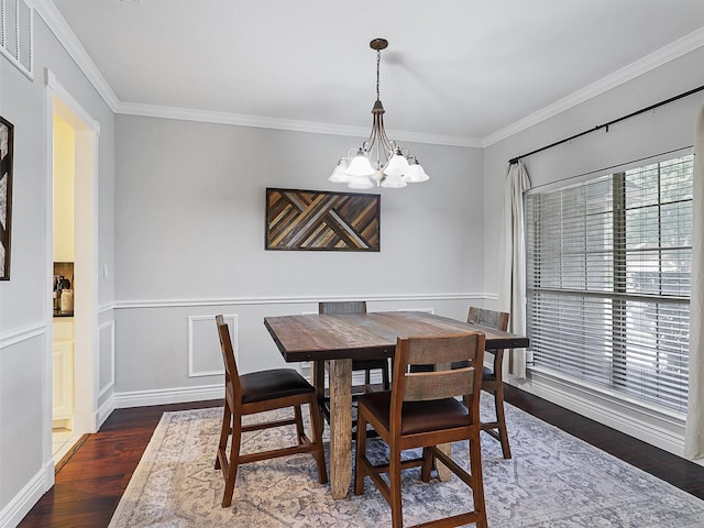 832 Adams Dr, Burleson, TX 76028 - dining room featuring a chandelier, wood finished floors, and ornamental molding