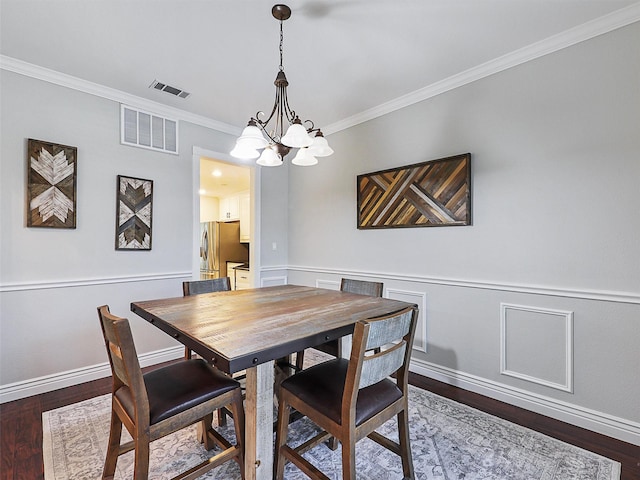 832 Adams Dr, Burleson, TX 76028 - dining room featuring crown molding, a chandelier, baseboards, and dark wood-style floors