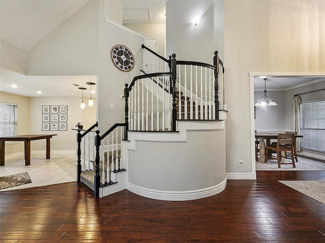 832 Adams Dr, Burleson, TX 76028 - stairway featuring wood-type flooring, high vaulted ceiling, and baseboards