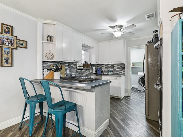 5433 Greenwood Way N, Richland Hills, TX 76180 - kitchen featuring a peninsula, open shelves, dark countertops, a ceiling fan, and tasteful backsplash