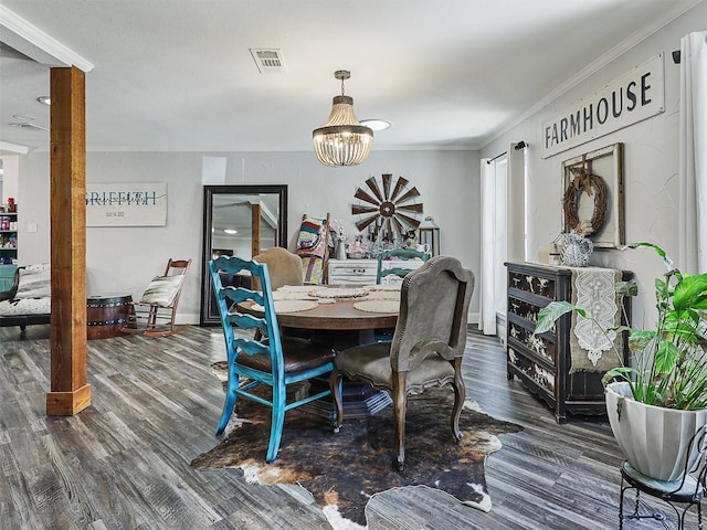 5433 Greenwood Way N, Richland Hills, TX 76180 - dining space featuring a chandelier, wood finished floors, crown molding, and baseboards