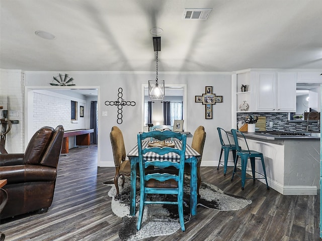 5433 Greenwood Way N, Richland Hills, TX 76180 - dining area with dark wood-style floors, baseboards, plenty of natural light, and crown molding