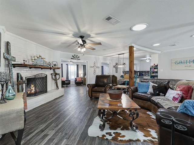 5433 Greenwood Way N, Richland Hills, TX 76180 - living area featuring a ceiling fan, wood finished floors, a fireplace, crown molding, and recessed lighting