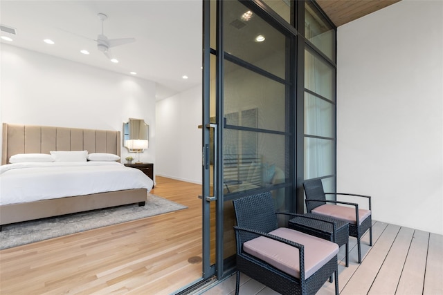 3723 Gilbert Ave, Dallas, TX 75219 - bedroom featuring wood finished floors and recessed lighting
