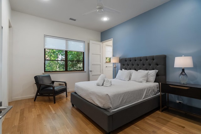 3723 Gilbert Ave, Dallas, TX 75219 - bedroom with light wood-type flooring, baseboards, a ceiling fan, and recessed lighting