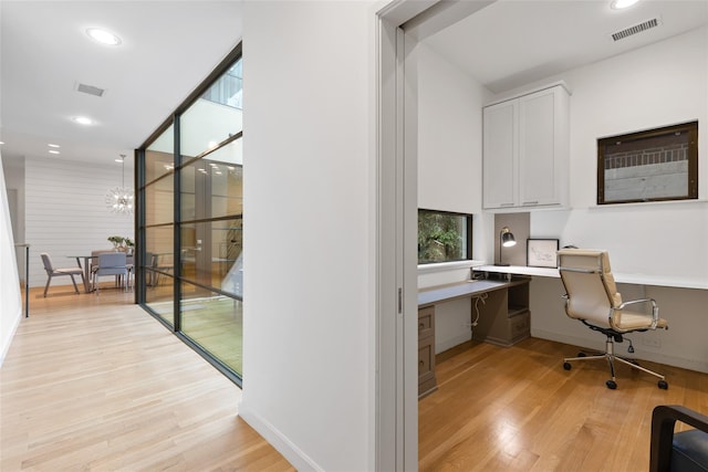 3723 Gilbert Ave, Dallas, TX 75219 - office space featuring built in study area, light wood finished floors, recessed lighting, and a chandelier