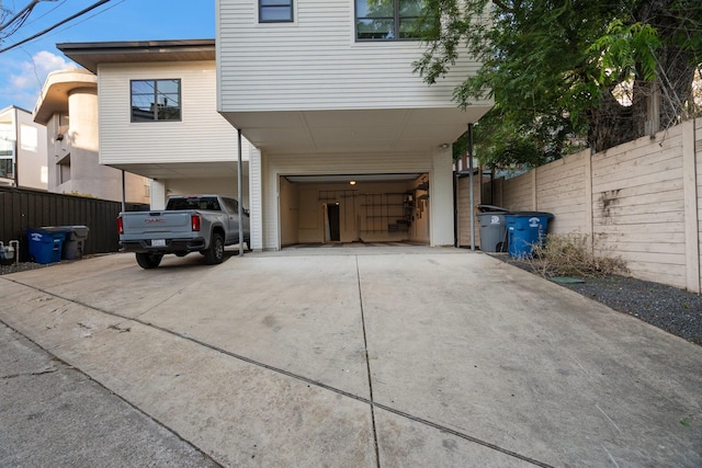 3723 Gilbert Ave, Dallas, TX 75219 - view of front facade with a carport and driveway