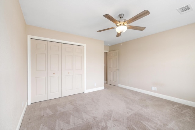 3004 Waterstone Way, Brownwood, TX 76801 - unfurnished bedroom featuring carpet, baseboards, a closet, and a ceiling fan
