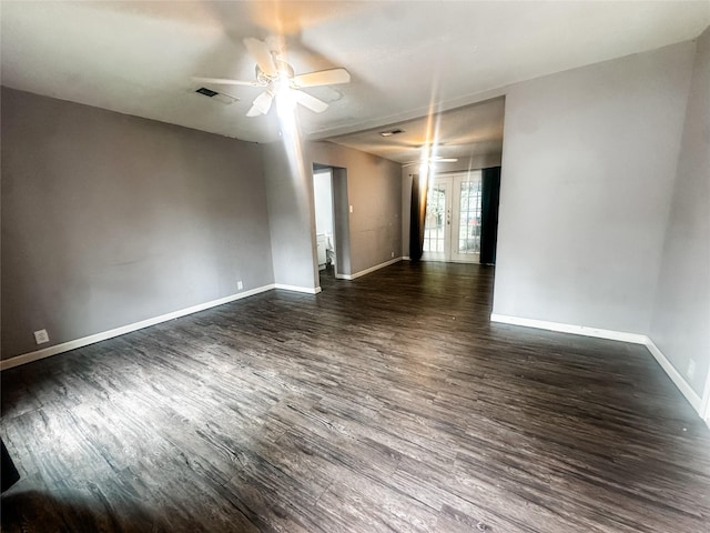 1706 N Ricketts St, Sherman, TX 75092 - spare room with dark wood-style floors, baseboards, and a ceiling fan