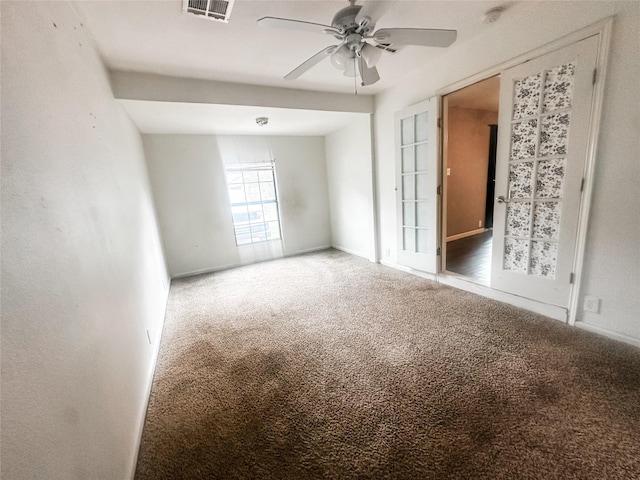 1706 N Ricketts St, Sherman, TX 75092 - carpeted spare room featuring a ceiling fan, a smoke detector, and baseboards