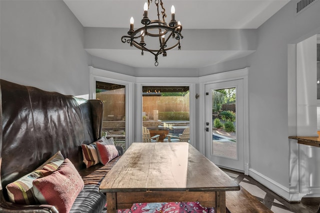 747 Kessler Lake Dr, Dallas, TX 75208 - dining area with a chandelier and baseboards
