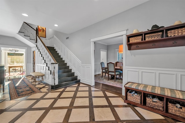747 Kessler Lake Dr, Dallas, TX 75208 - mudroom with inlaid floor details, healthy amount of natural light, recessed lighting, wainscoting, and a chandelier