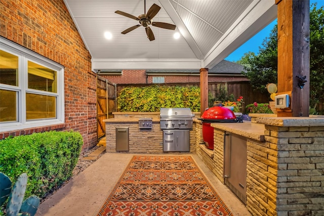 747 Kessler Lake Dr, Dallas, TX 75208 - view of patio with an outdoor kitchen, ceiling fan, fence, and a grill