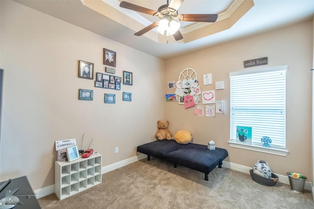 5158 Spring Creek Rd, Abilene, TX 79602 - living area featuring carpet, a ceiling fan, a tray ceiling, baseboards, and ornamental molding