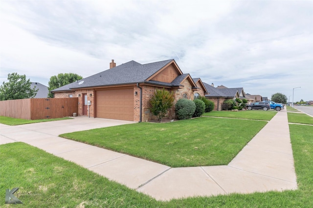 5158 Spring Creek Rd, Abilene, TX 79602 - view of side of property featuring concrete driveway, an attached garage, brick siding, a chimney, and a shingled roof